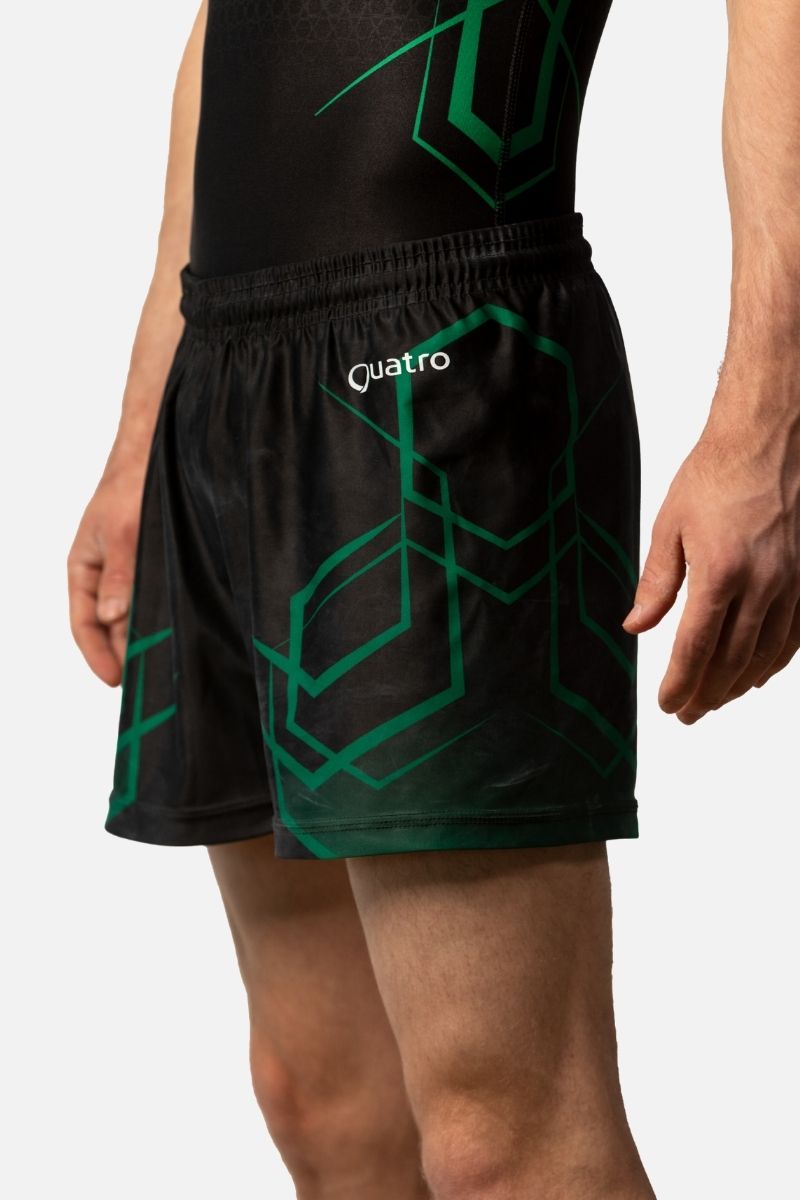 Schwarze und grüne Shorts „Determination“